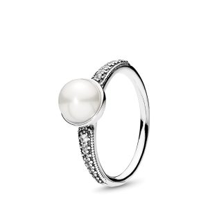 Freshwater cultured pearl silver ring with clear cubic zirconia. 7 mm