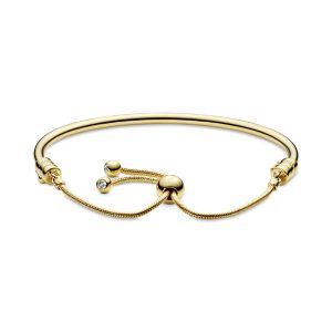 14k Gold Plated bangle with clear cubic zirconia and sliding clasp